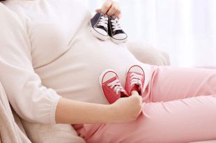 العلامات المبكرة وأعراض الحمل بتوأم